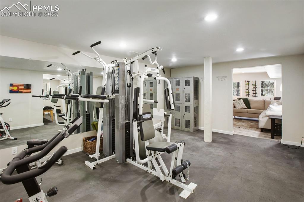 Image 24 of 50: Lower level full workout room
