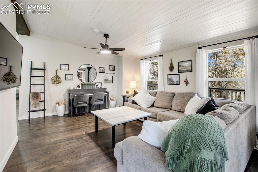 Image 5 of 50: Main level living room with beautiful furnishings