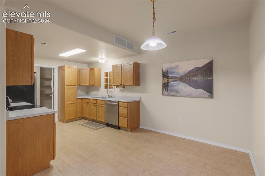 Image 11 of 45: Dining Area / Kitchen