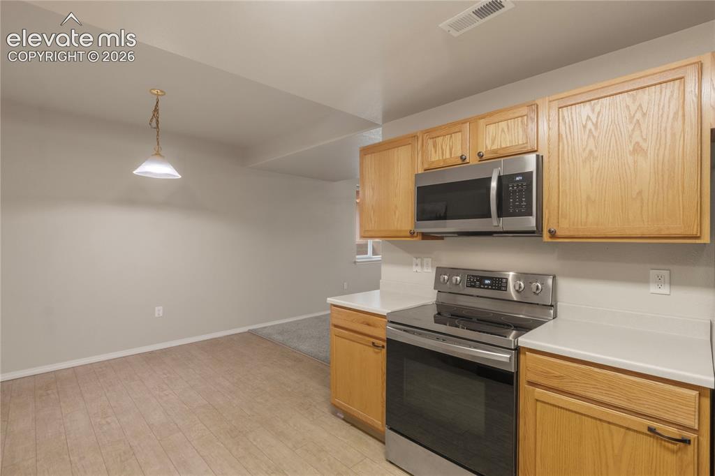 Image 17 of 45: From Kitchen looking to Dining Area