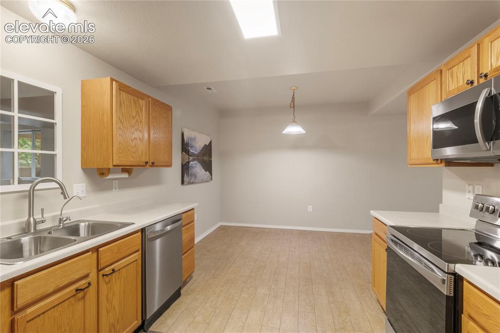 Image 18 of 45: From Kitchen to Dining Area