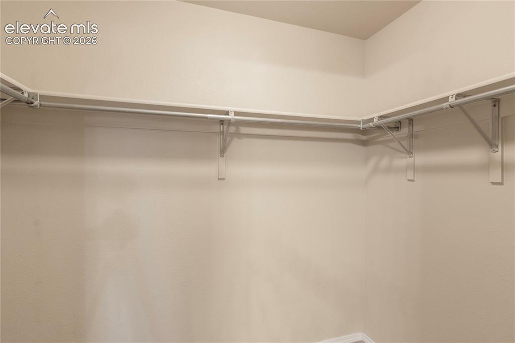 Image 34 of 45: Large Walk-in Closet