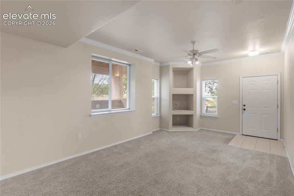 Image 8 of 45: Wider Angle from Living Room to Entrance