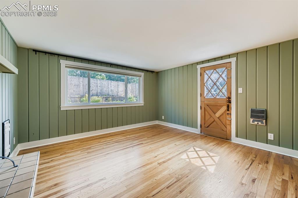 Image 11 of 28: Foyer with plenty of natural light, light wood-style flooring, and heating