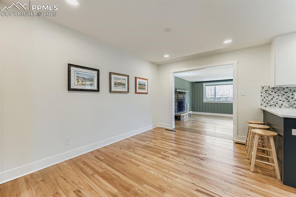 Image 6 of 28: Unfurnished dining area featuring recessed lighting and light wood-type flo