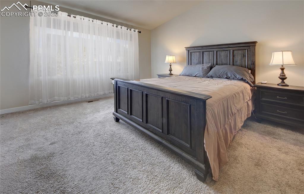 Image 11 of 36: Master bedroom