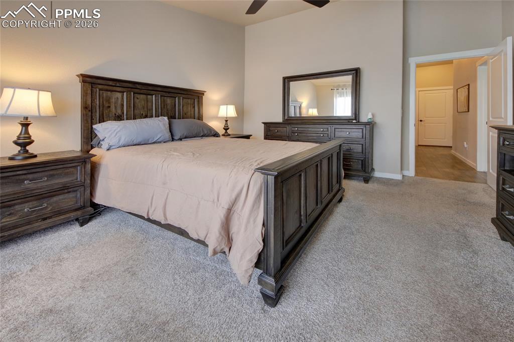 Image 13 of 36: Master bed has ceiling fan