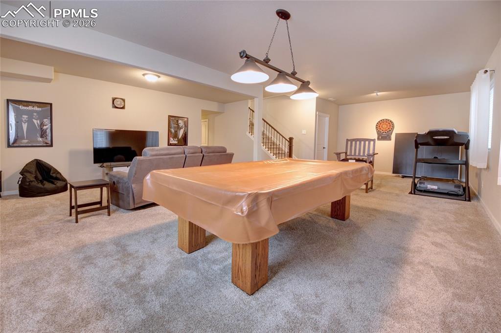 Image 23 of 36: Family room game area