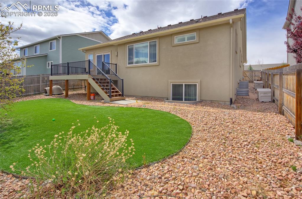 Image 34 of 36: Rear view of home