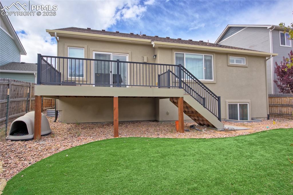 Image 35 of 36: Stucco siding