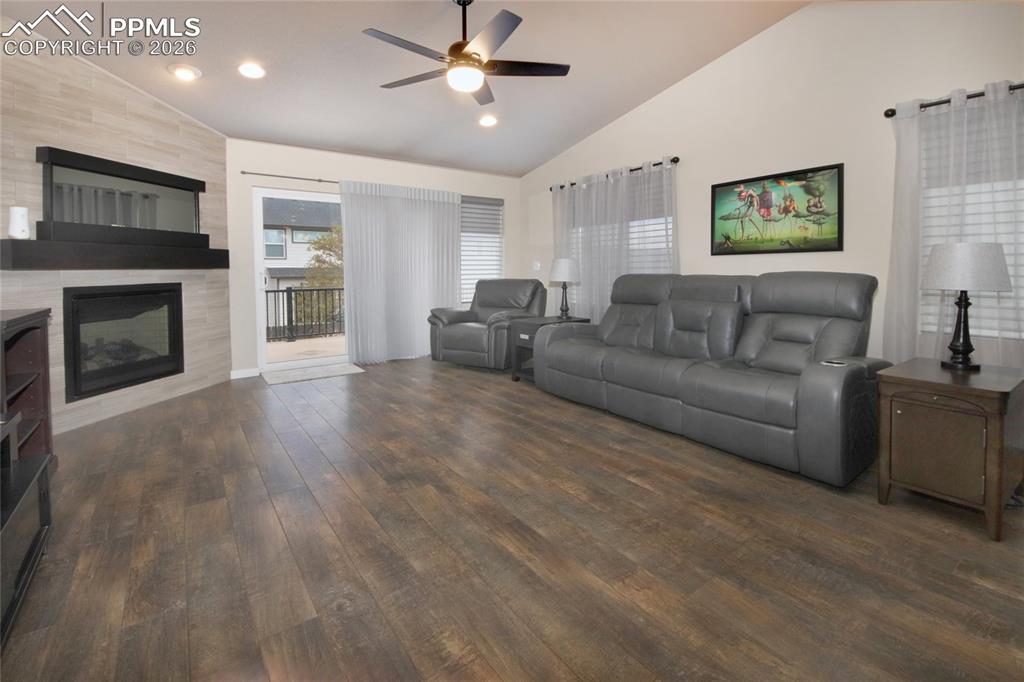 Image 8 of 36: Living room walks out to trex deck