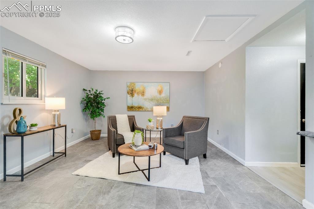 Image 15 of 23: Sitting room featuring baseboards