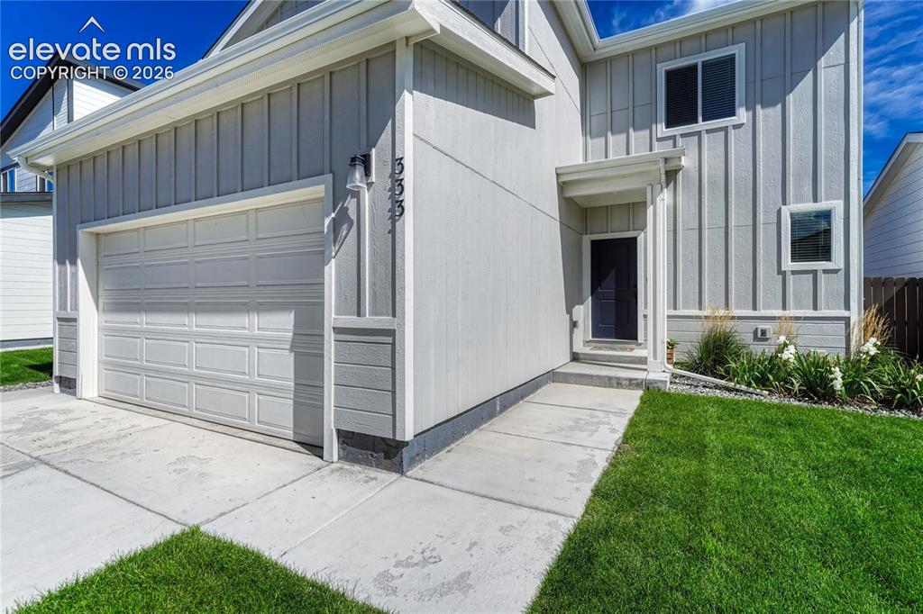 Image 2 of 30: ...2-car garage and central air conditioning.