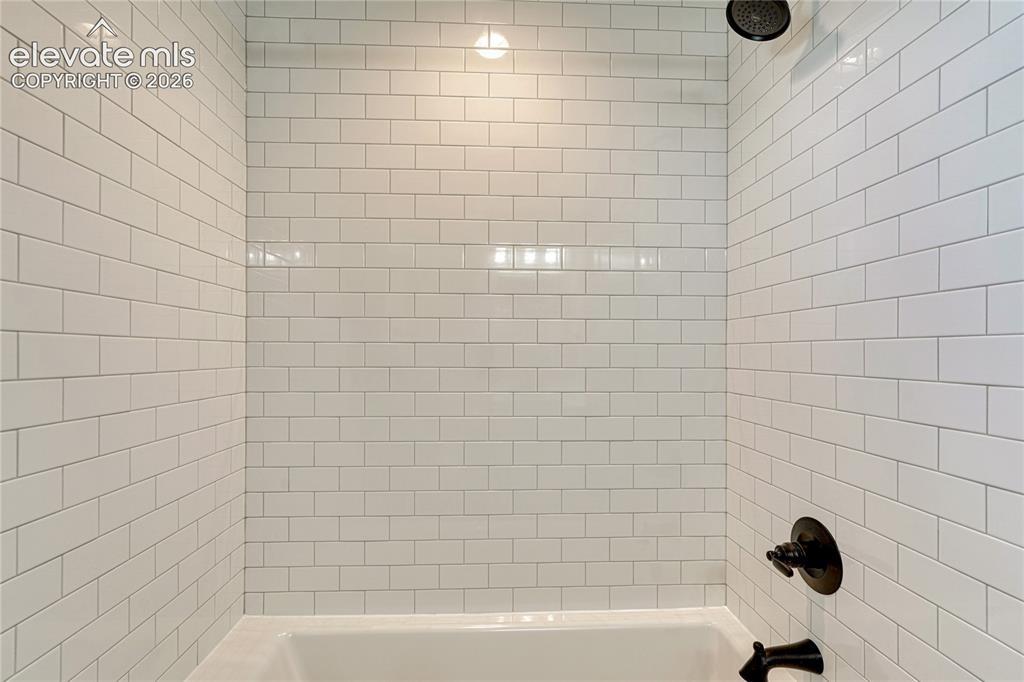 Image 24 of 30: ...and subway tile. 