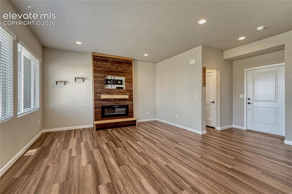 Image 4 of 30: ...and electric fireplace.