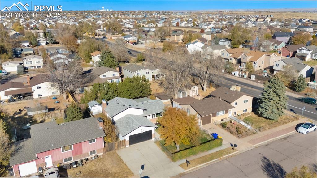 Image 29 of 34: View of property location with nearby suburban area