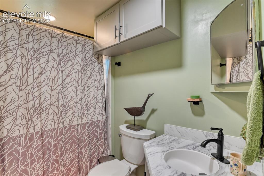 Image 25 of 47: Full size shower and tub elegant and private.