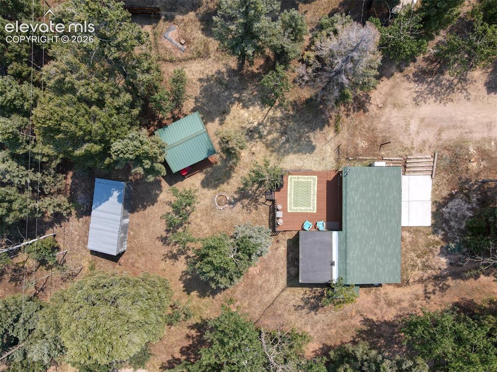 Image 3 of 47: Overhead property perspective featuring a huge storage structure, guest cab