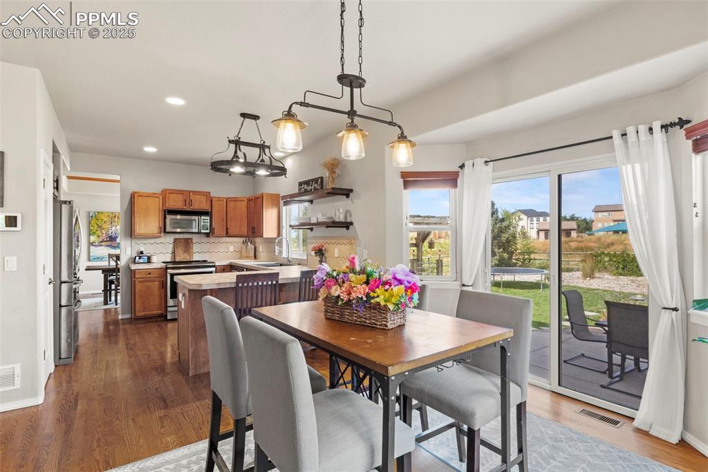 Image 16 of 41: Kitchen exits to your back yard