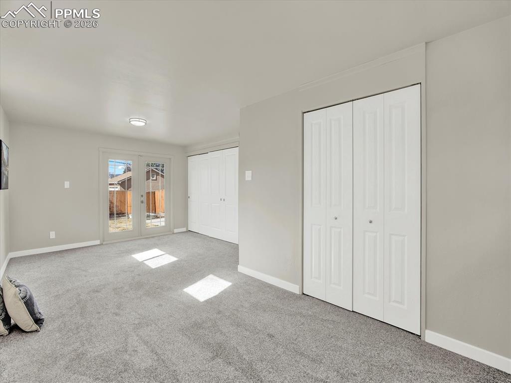 Image 15 of 42: French doors, walk-out to the private deck!