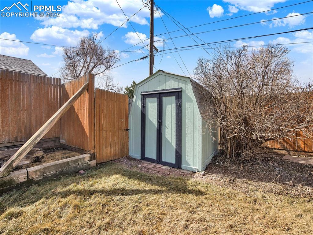 Image 31 of 42: Backyard storage shed