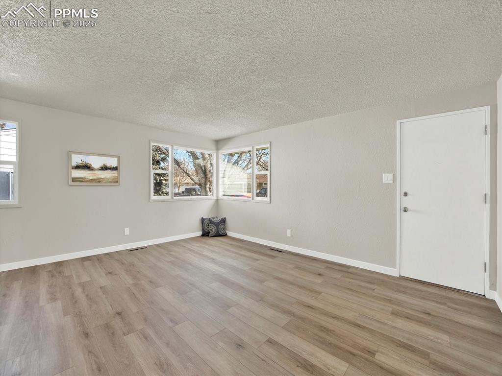 Image 5 of 42: Main level living room