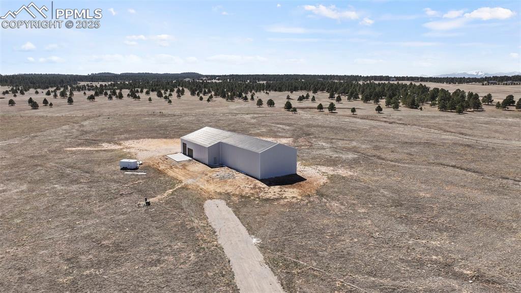 Image 9 of 18: Also on the property is a fully built-out attached oversized RV garage (5,6