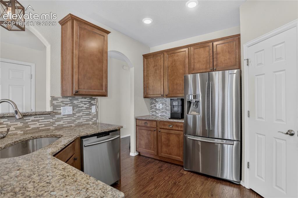 Image 13 of 31: Kitchen w/ SS appliances