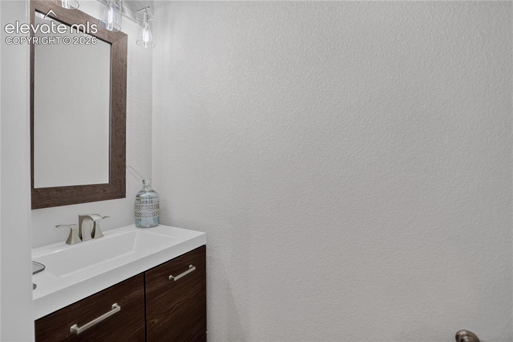 Image 16 of 31: Main level powder room