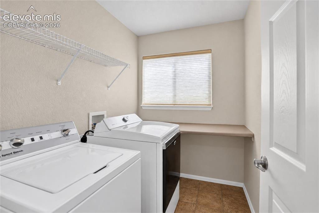 Image 24 of 31: Convenient upper level laundry