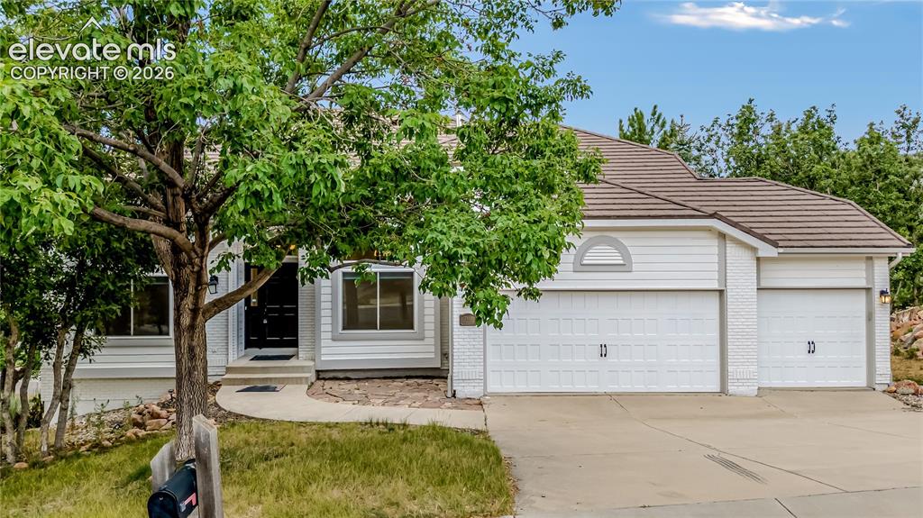 Image 1 of 34: Located in the Northlands at Peregrine neighborhood with mature trees.