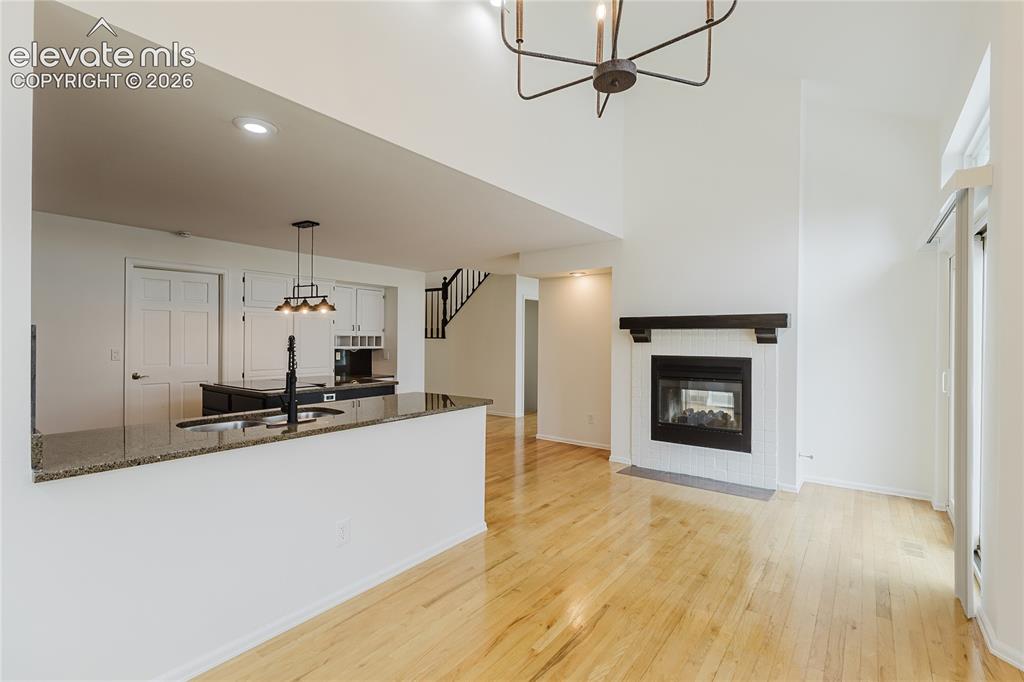Image 10 of 34: Space to gather and eat makes this main level an entertainer