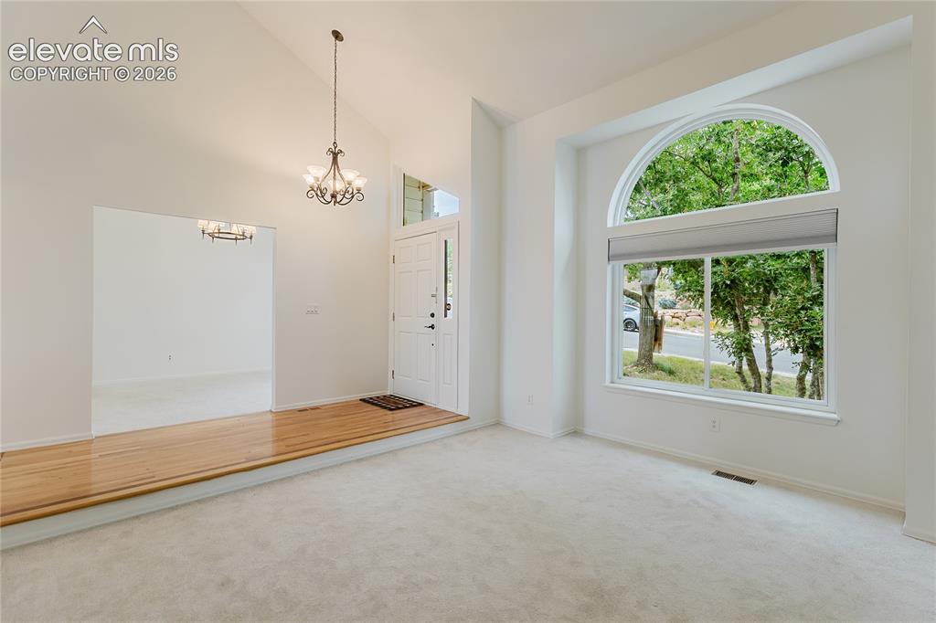 Image 3 of 34: Formal living room upon entry