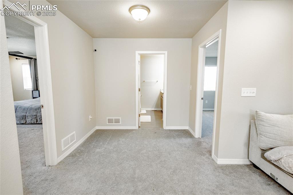 Image 11 of 25: Upstairs landing into bedrooms and loft