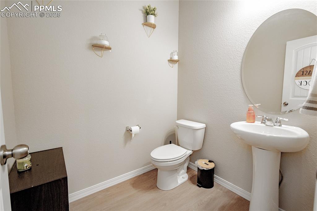 Image 4 of 25: Downstairs half bath