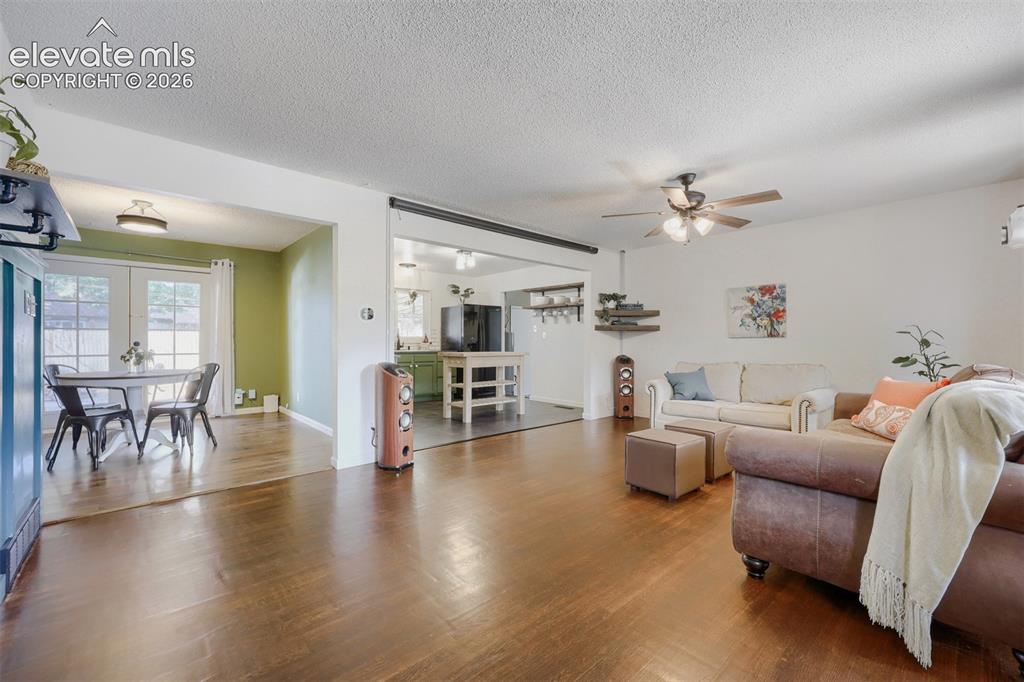 Image 3 of 20: Large open concept living and dining space