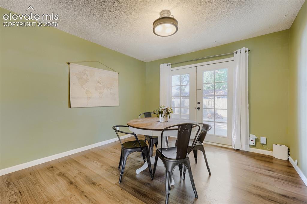 Image 6 of 20: Dining space walks out to back yard