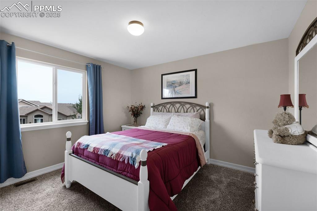 Image 23 of 36: Bedroom