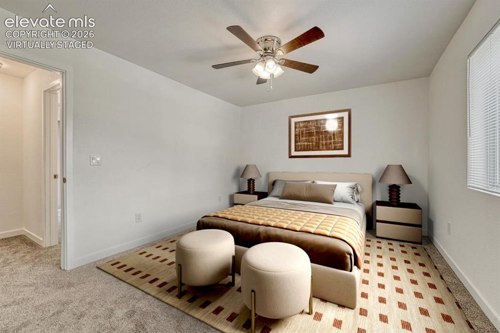 Image 13 of 50: Primary bedroom virtually staged