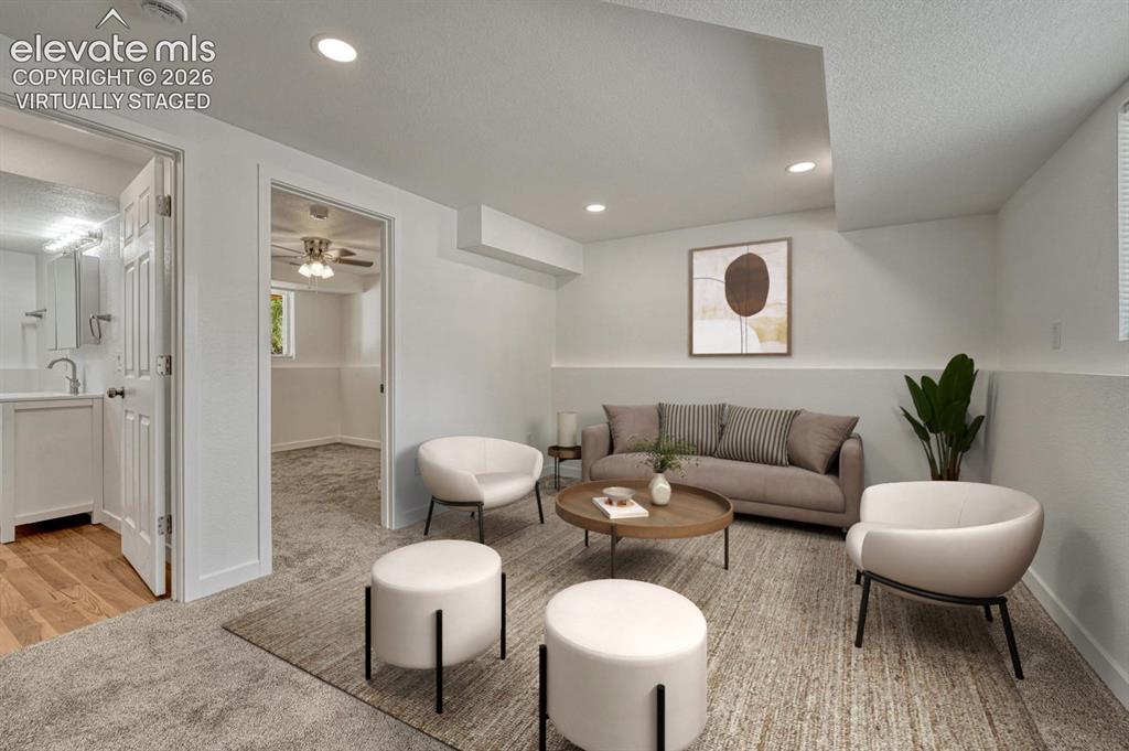 Image 21 of 50: Family room virtually staged