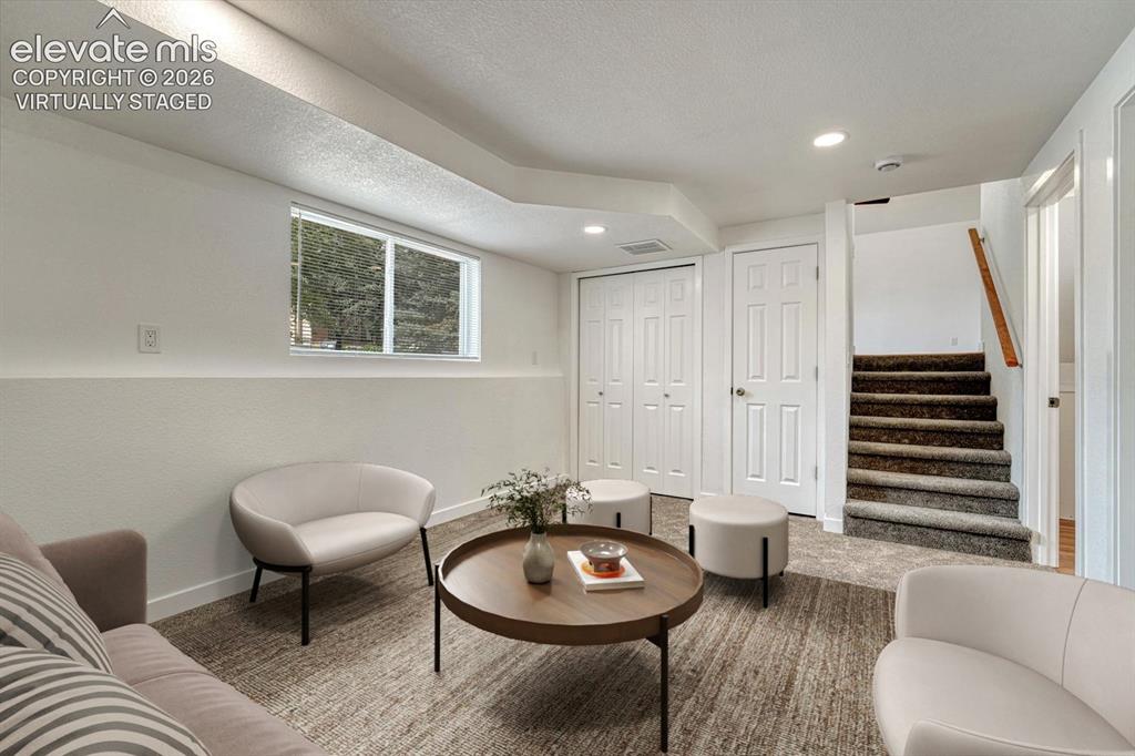 Image 22 of 50: Family room virtually staged