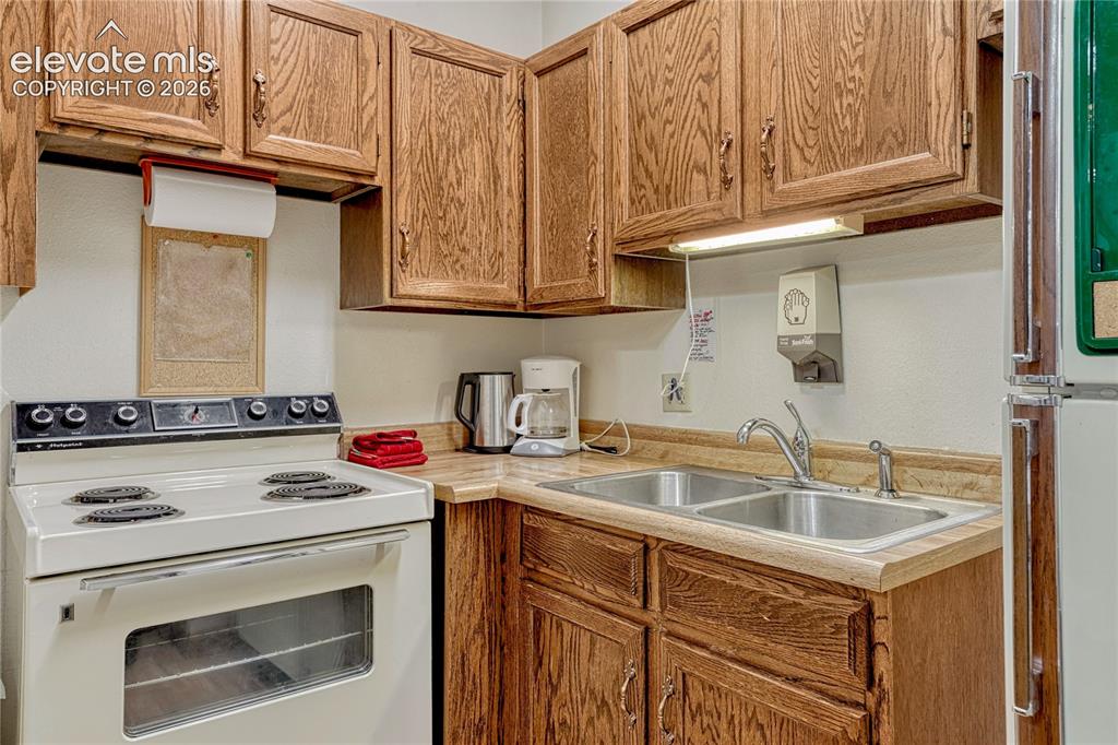 Image 32 of 50: This kitchen is in the Clubhouse just outside the dining room/crafting tabl
