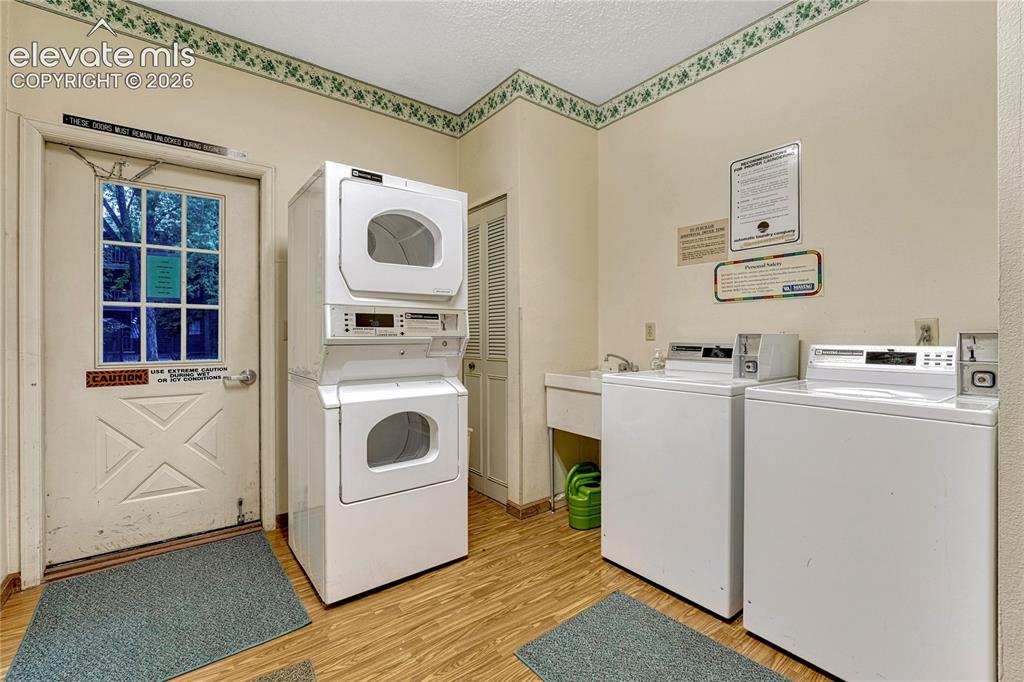 Image 34 of 50: A large size washer & dryer is also available in the Club House- although y
