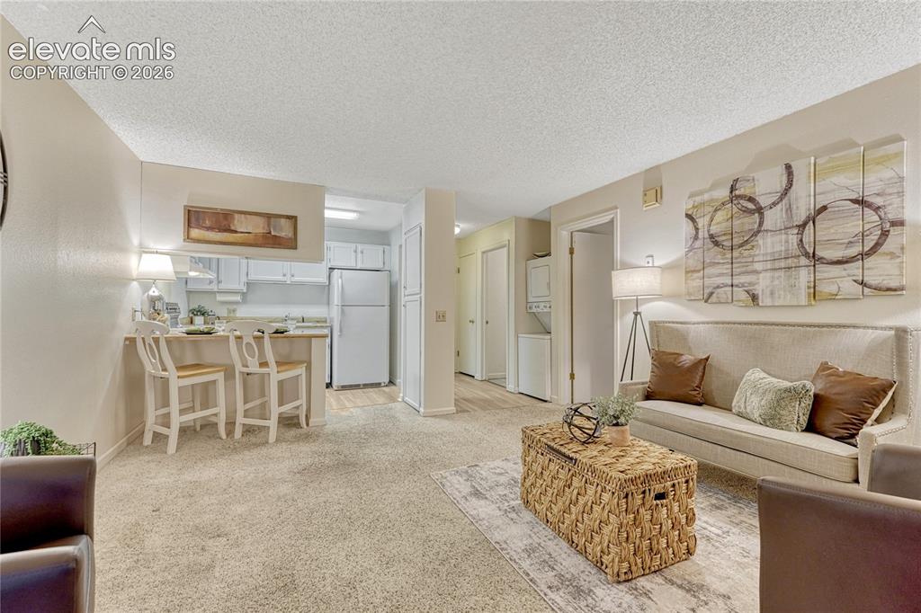 Image 7 of 50: This entire space is cooled by a permanent window A/C unit in the bedroom