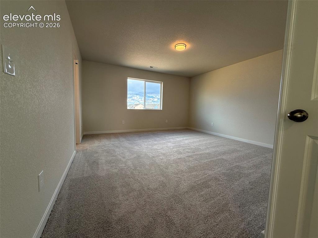 Image 24 of 39: Master Bedroom