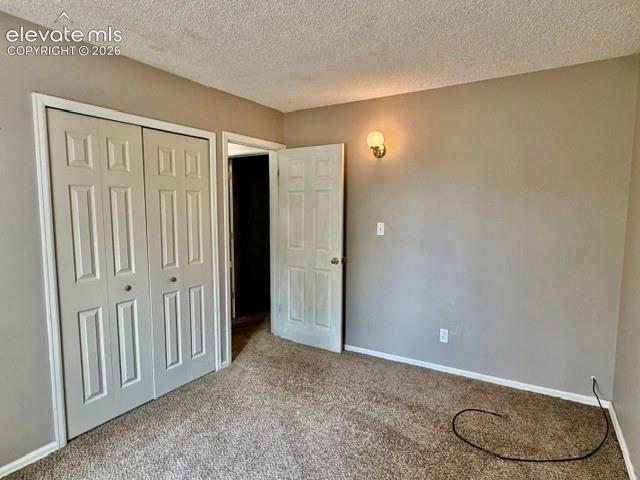 Image 17 of 27: 2nd upstairs bedroom, two closets