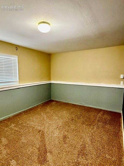 Image 21 of 27: Lower level non conforming bedroom, no closet.