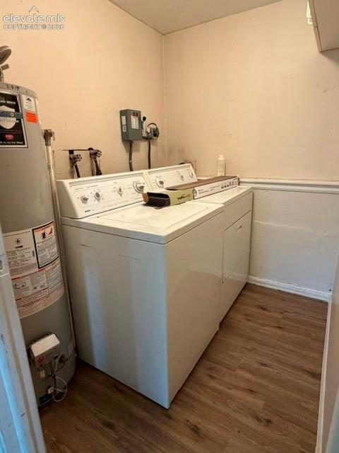 Image 25 of 27: Lower level laundry including washer and dryer