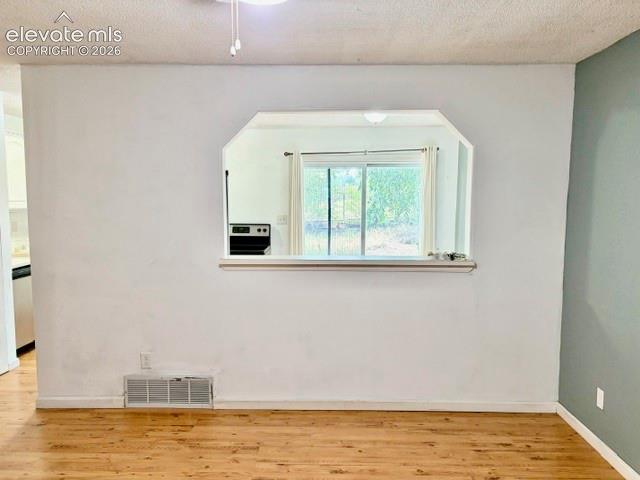 Image 8 of 27: Looking into kitchen 