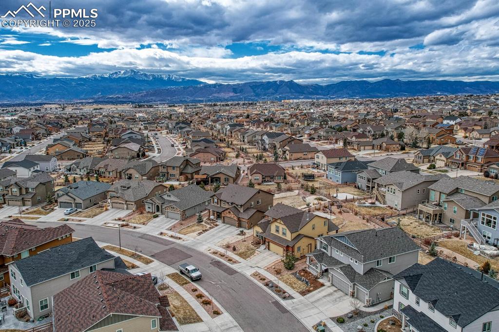 Image 41 of 44: Birds eye view of property featuring a mountain view and a residential view